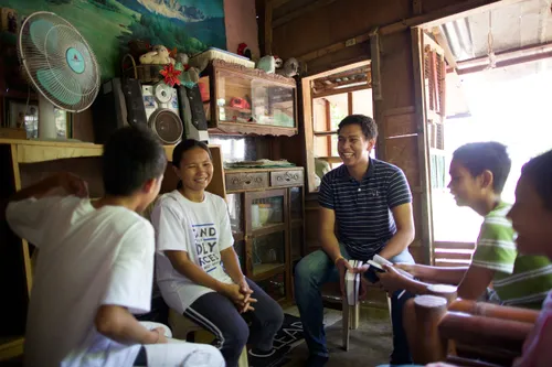 family gathered together and smiling