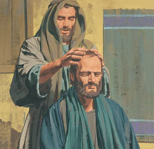 man blessing another man