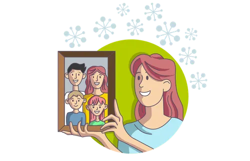 woman holding up a family picture