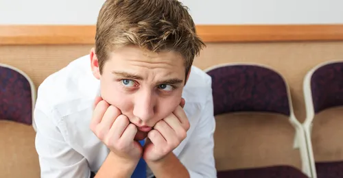 Young man looking sad