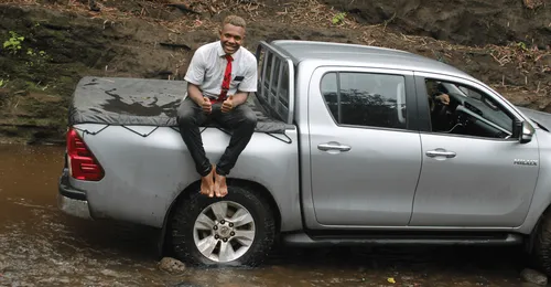 missionaries with a pickup truck