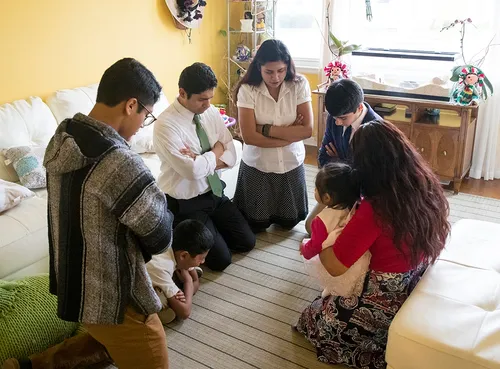 family praying