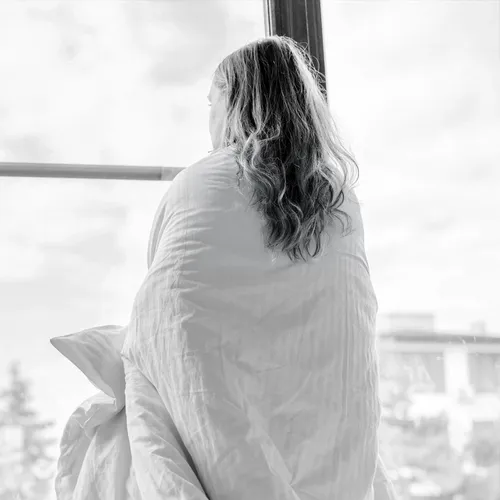 woman wrapped in a blanket