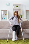 woman on crutches and foot in a cast