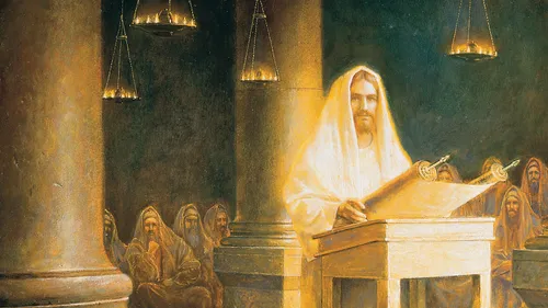 Jesus reading a scroll to people in a synagogue