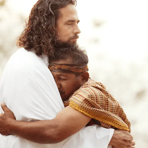Jesus Christ embracing a man