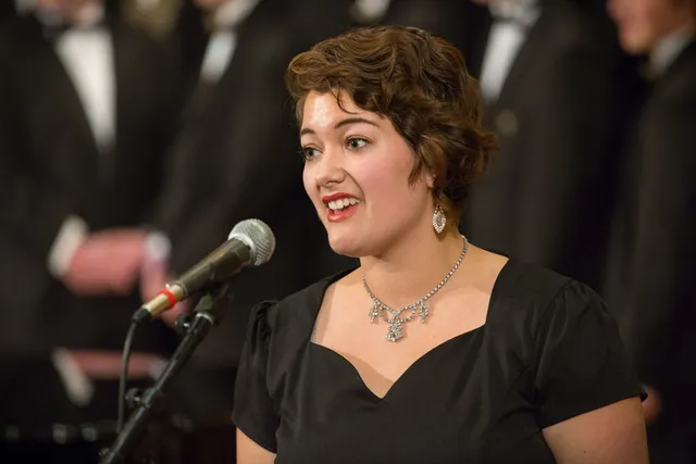 Series of images of high school students from Roy High singing at a Christmas Choir for temple square events in the Assembly Hall