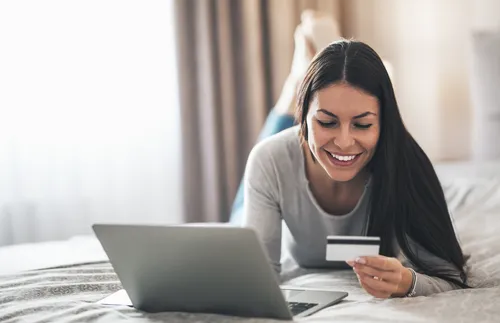 young woman in front of a laptop computer