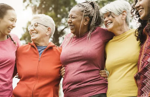 group of women hugging each other