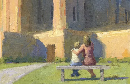 mother and son sitting in front of temple