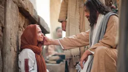 Jesus Christ heals a woman who through faith touched His clothes and was healed