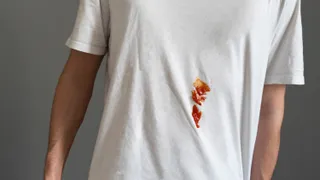 Stain spot on the clothes, white t-shirt