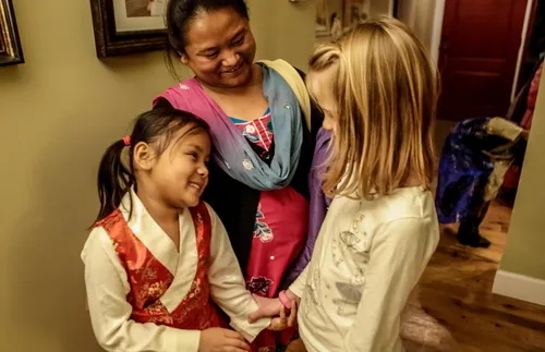 Greeting a refugee family