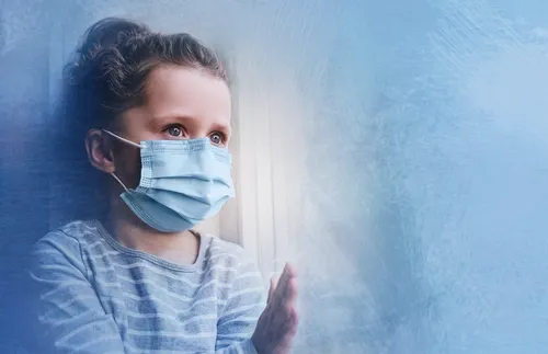 girl wearing a medical mask