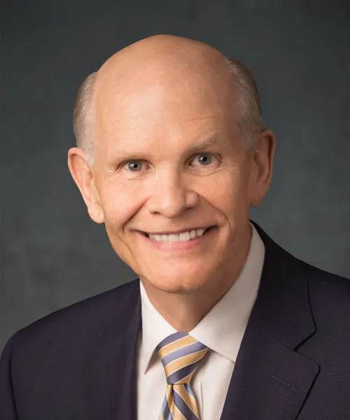 Elder Dale G. Renlund takes an official portrait in 2021.