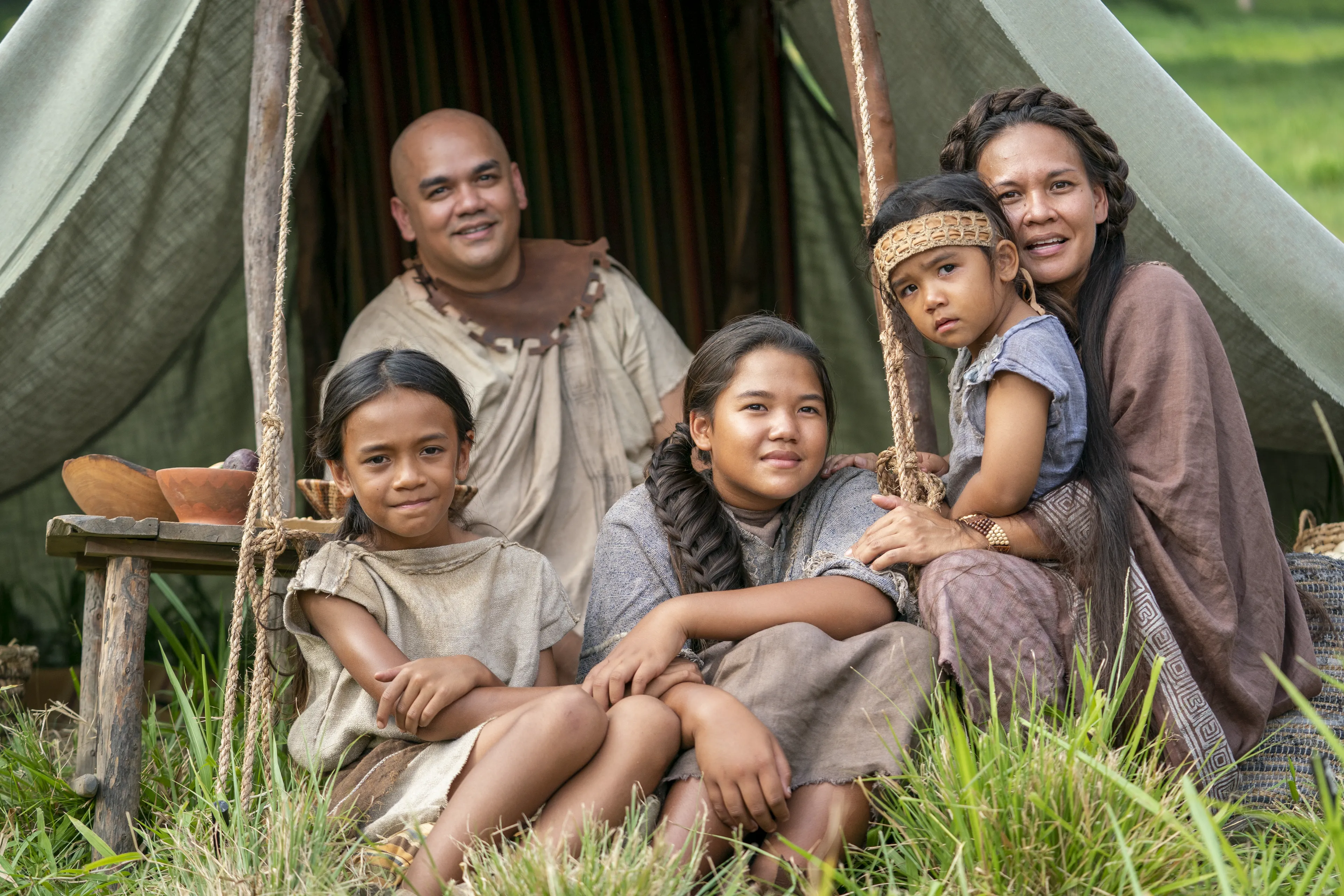 Men and women gather to listen to King Benjamin in the Land of Zarahemla.
