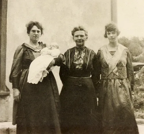 three women and a baby
