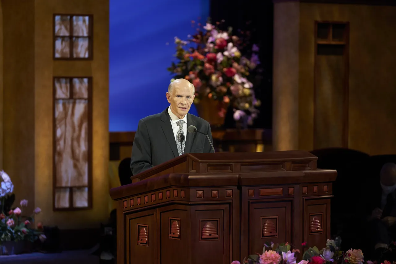 Dale G. Renlund speaking at a pulpit