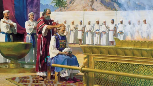 Moses lays his hands on Aaron’s head