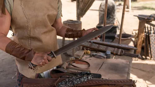 a depiction of Nephi holding a sword