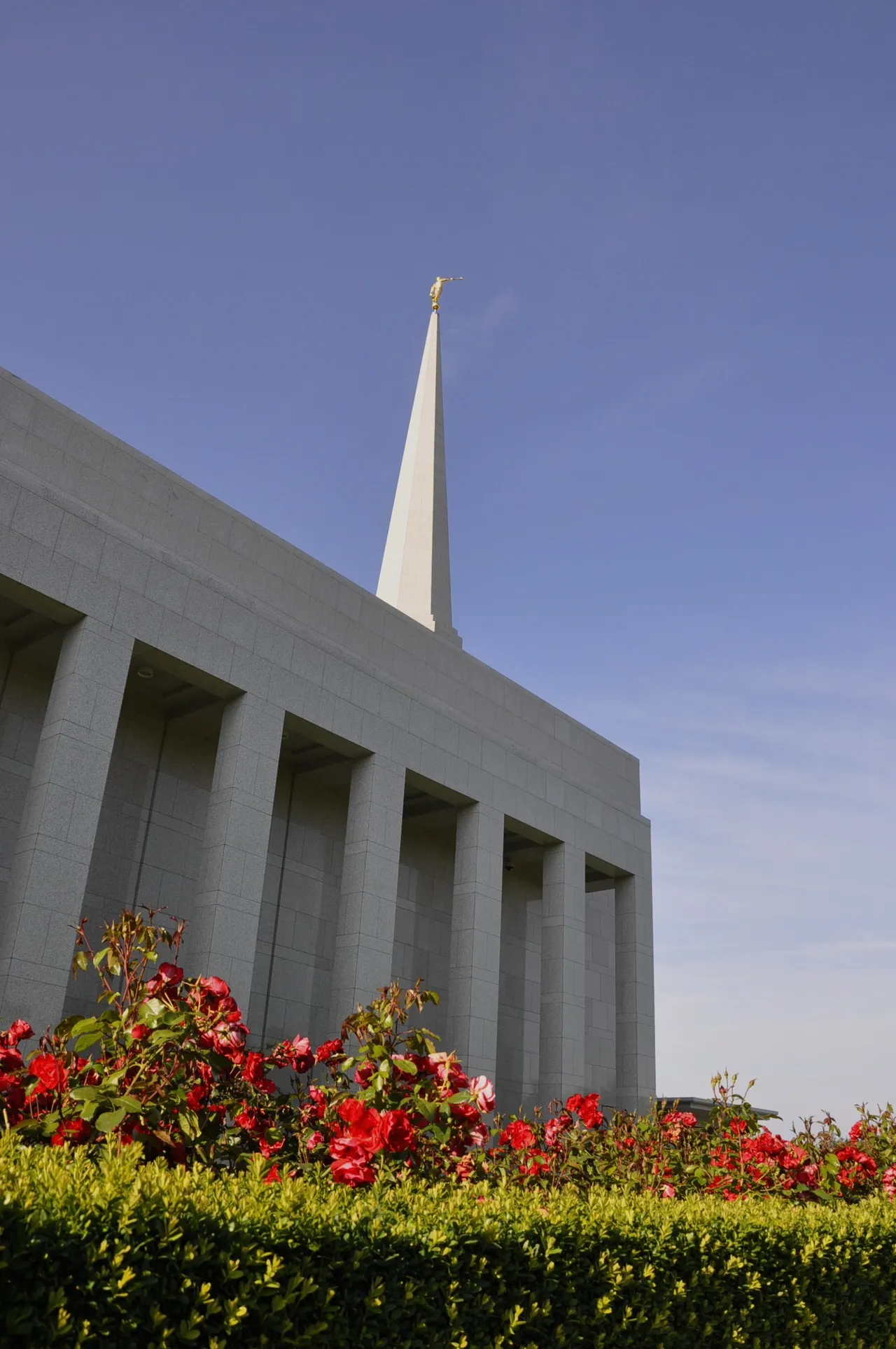 The Preston England Temple spire, including scenery and the exterior of the temple.