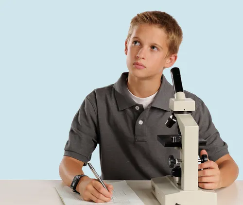 boy with microscope