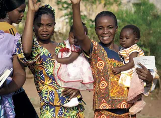 women carrying children