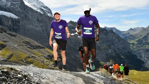 Blind marathoner with his guide