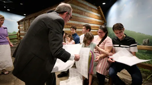 Families explore inside the Independence Visitors' Center.