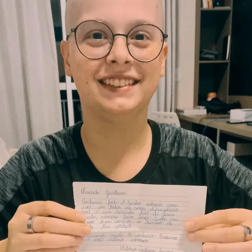 young man reading letters