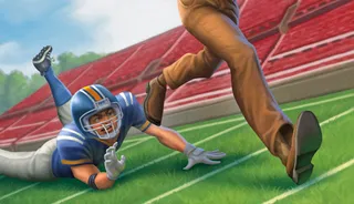 football player attempting tackle