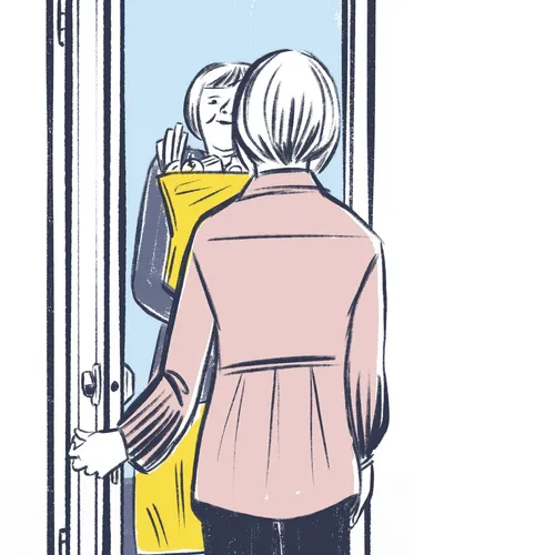 woman handing groceries to another woman