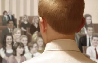 young man facing congregation