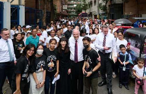 Elder Neil L. Andersen with people in the Philipppines