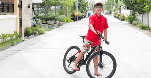 young man on a bicycle
