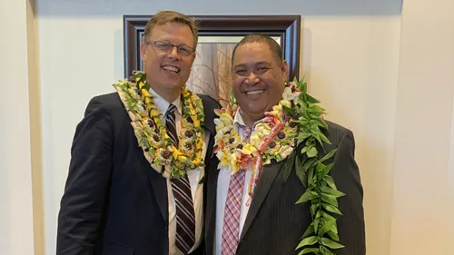 John Raass with Elder Gilbert at John’s baptism