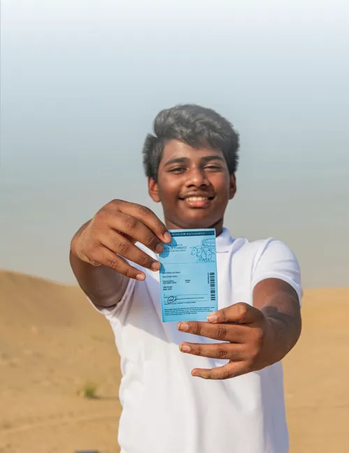 young man holding up a temple recommend