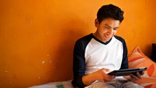 Young adult male studying in Bolivia