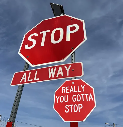 Stop sign with “Really you gotta stop” added