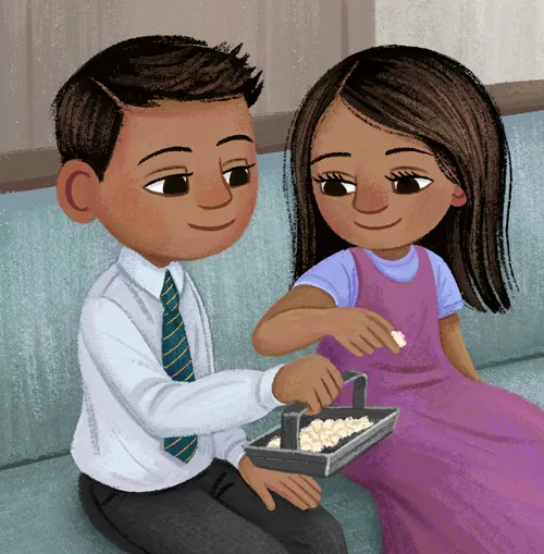 Boy and girl sitting in a church pew taking the sacrament bread