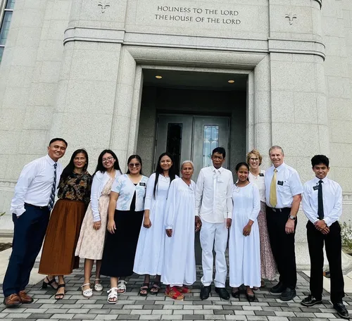 Agamata family outside the temple.