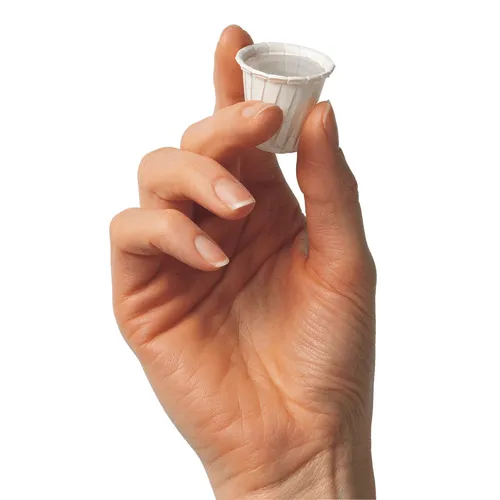 hand holding a sacrament water cup