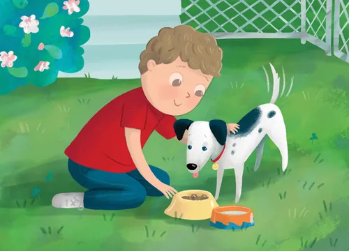 Boy feeding a dog