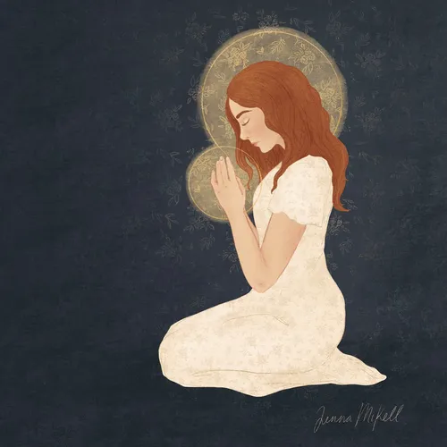 a young woman kneeling and praying