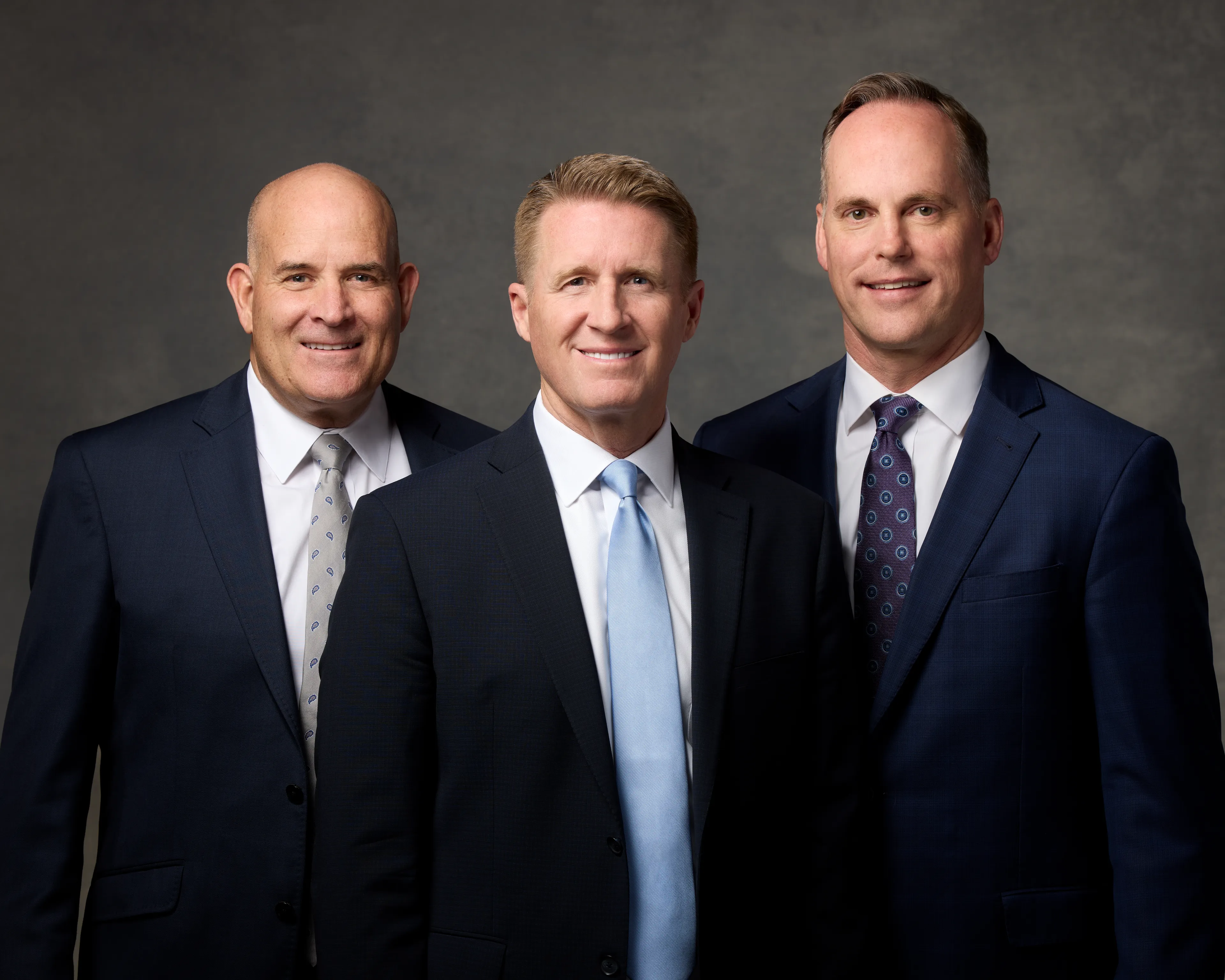 The Young Men General Presidency of The Church of Jesus Christ of Latter-day Saints, effective Aug. 1, 2025. From left to right: Brother David J. Wunderli, first counselor; President Timothy L. Farnes; and Brother Sean R. Dixon, second counselor.