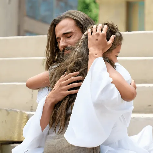 Jesus Christ hugging a girl