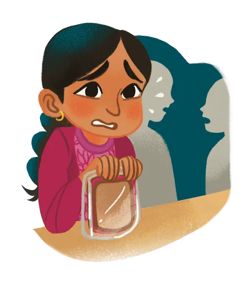 Girl looking scared, sitting at a table and holding a sandwich