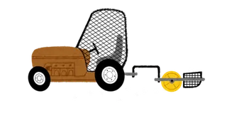 A tractor collecting golf balls off the ground