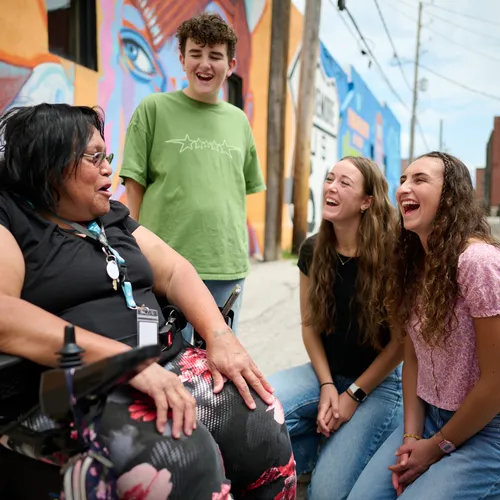 youth with person in wheelchair