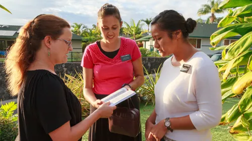 sisters reading the scriptures